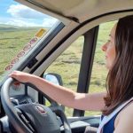 woman driving a bunk camper